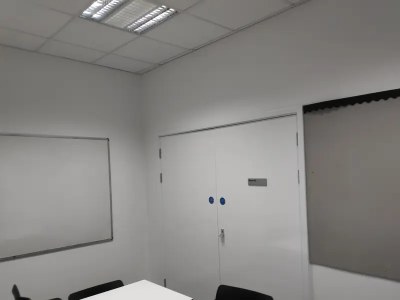 Milton Keynes Academy, Milton Keynes — meeting room with a whiteboard and freshly painted walls